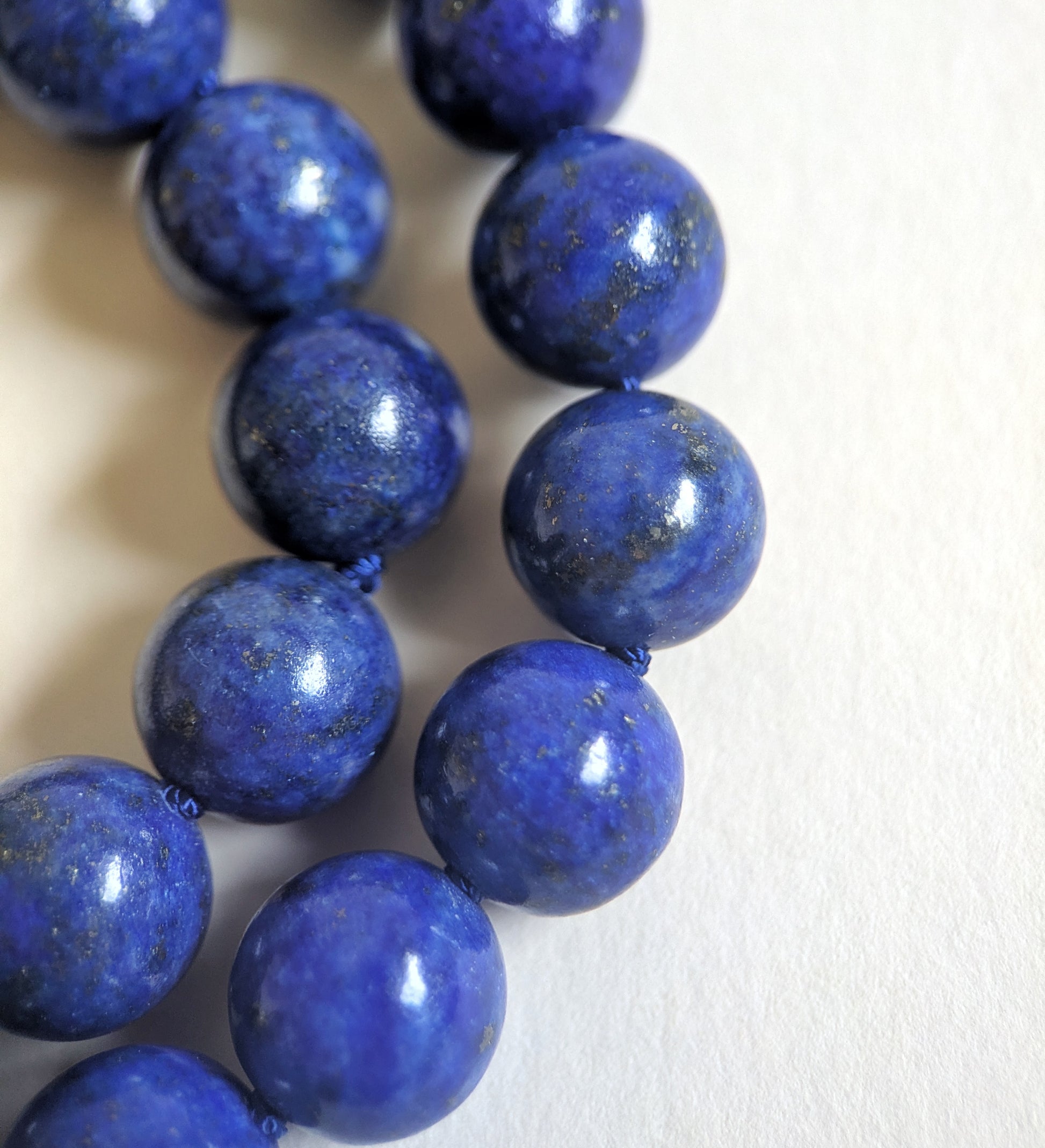Closeup of lapiy lazuli 10mm beads.