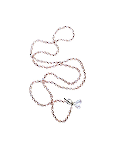 Long pink pearl necklace Vesper on a white background.