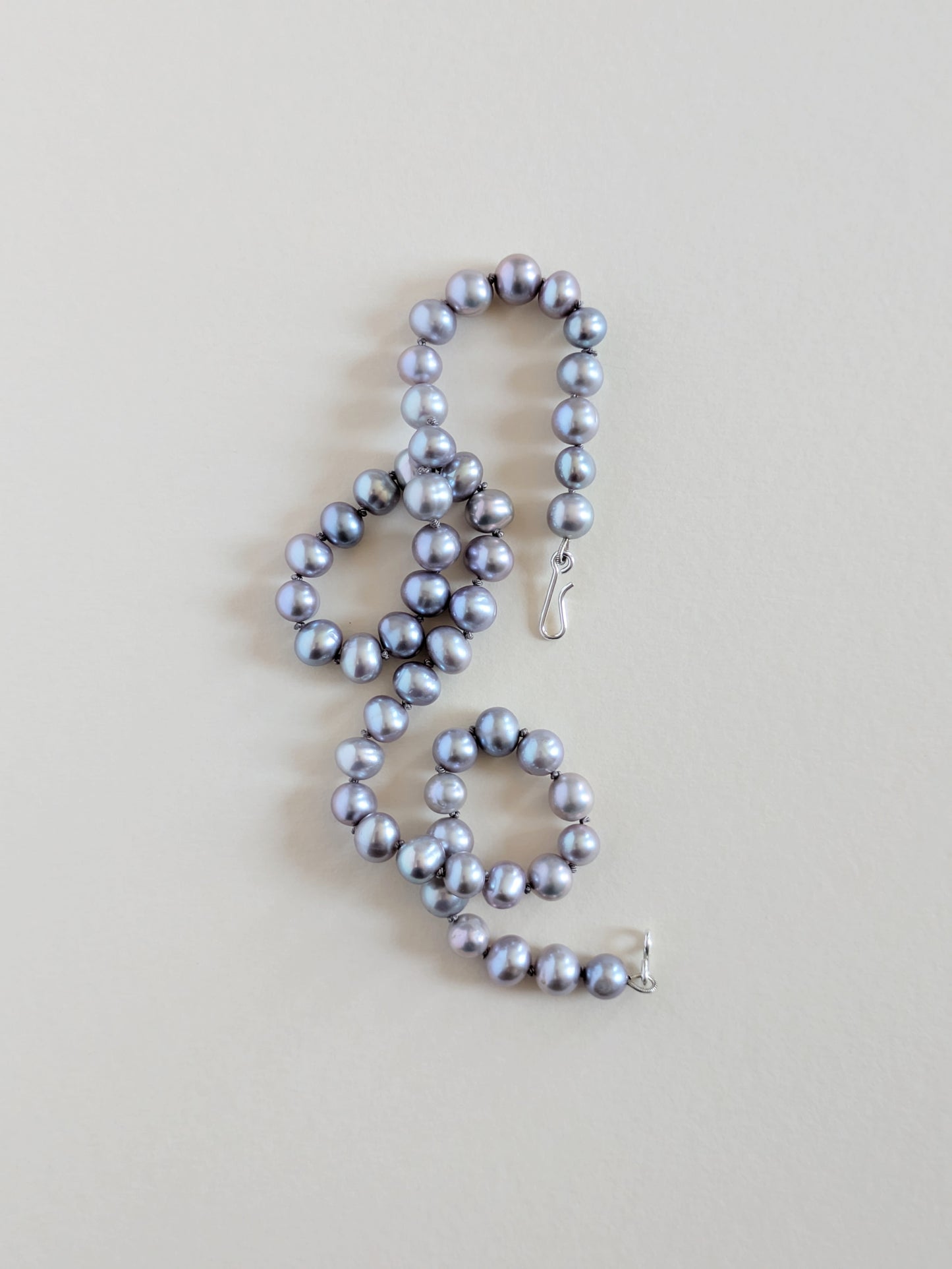 Grey pearl strand.
