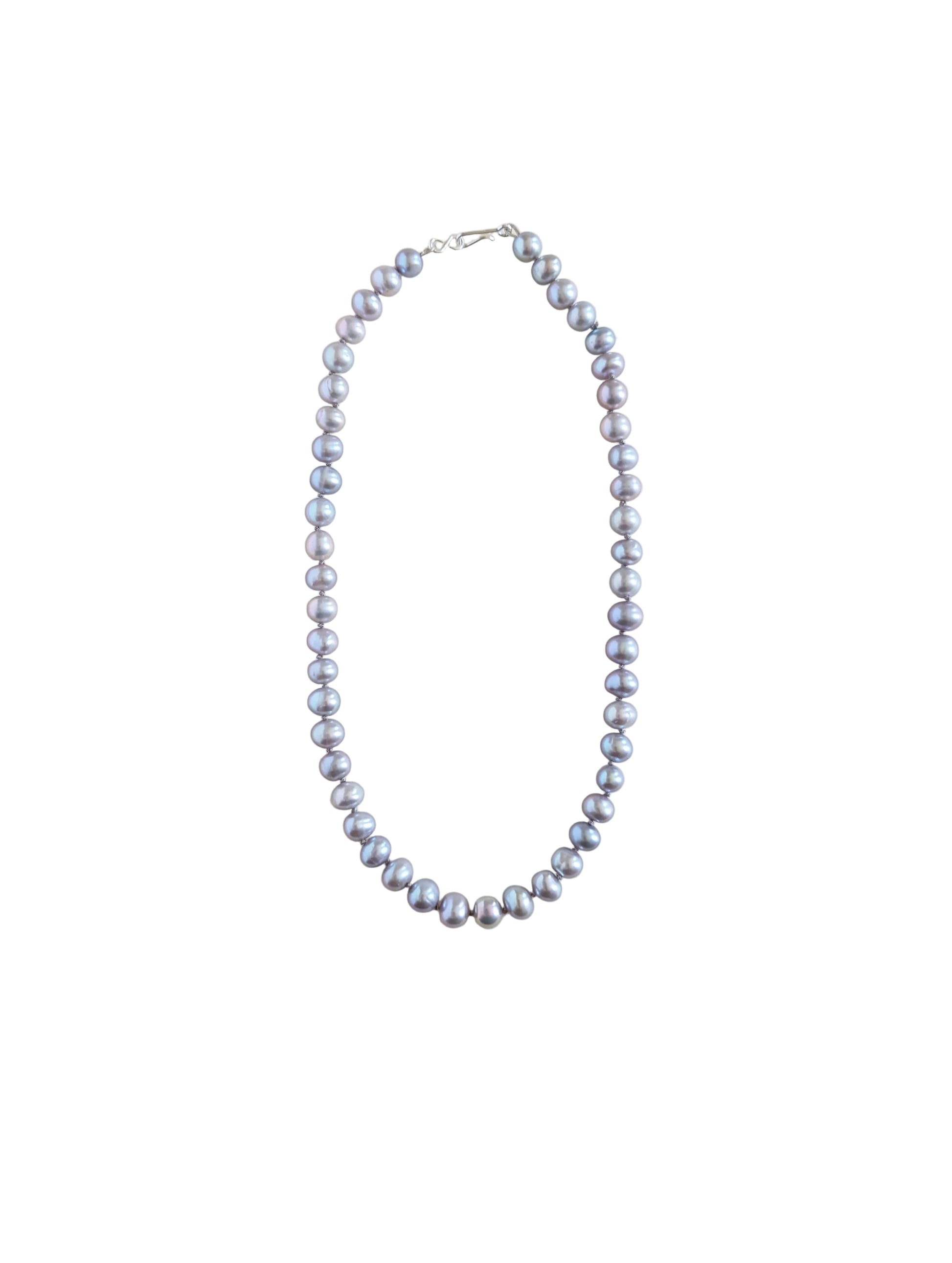Pearl necklace on a white background