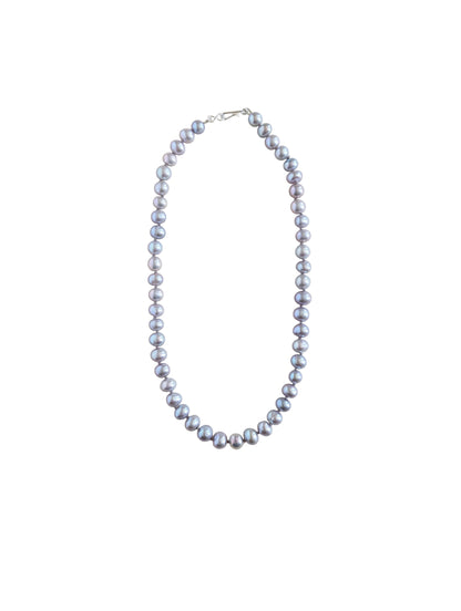 Pearl necklace on a white background