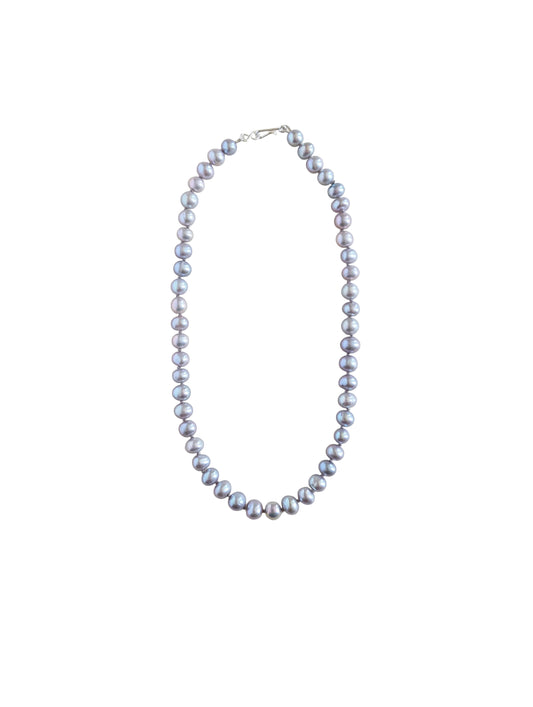 Pearl necklace on a white background