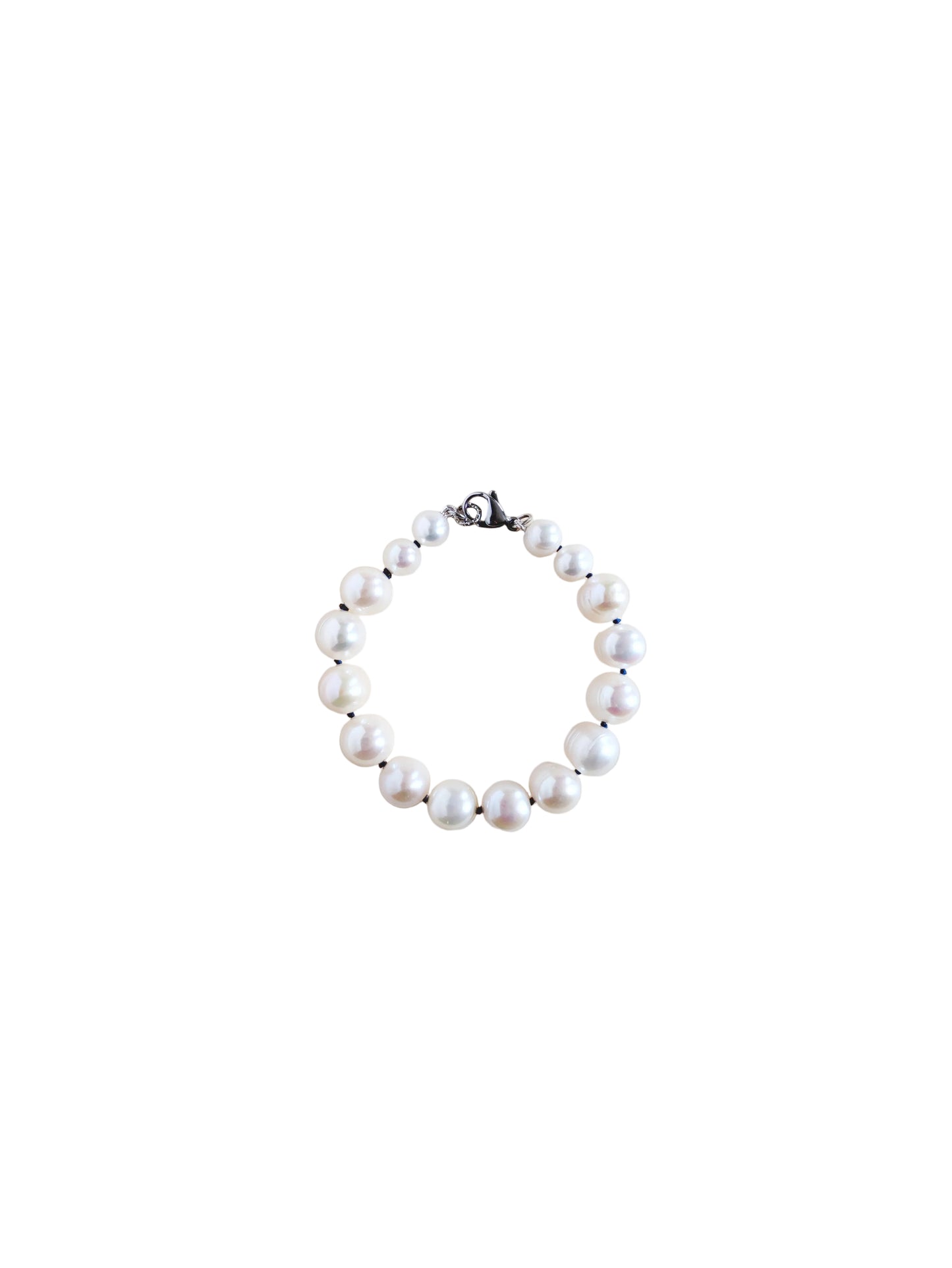 Pearl bracelet on a white background
