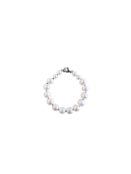 Pearl bracelet on a white background
